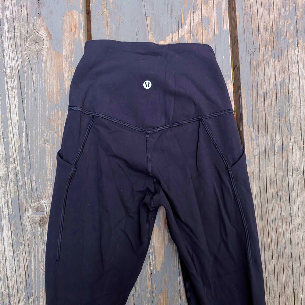 Lululemon Black High Rise Athletic Leggings Yoga Pants with Side Pockets Size 2